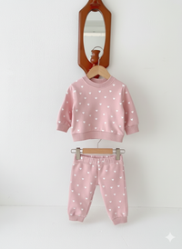 HAPPY FAMILY Baby Sweater, two pieces are on hanger, light blue background, front view, vivid and playful mode